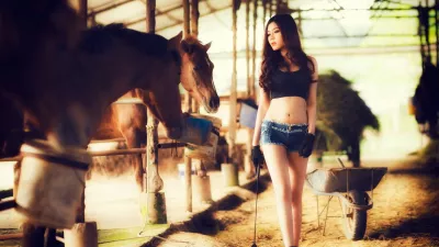 Chica asiática con caballos